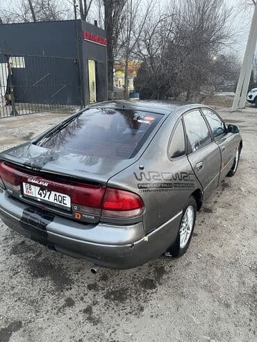 продаю авто с последующим выкупом: Mazda 626: 1992 г., 2 л, Механика, Бензиновая, Хэтчбэк — 7