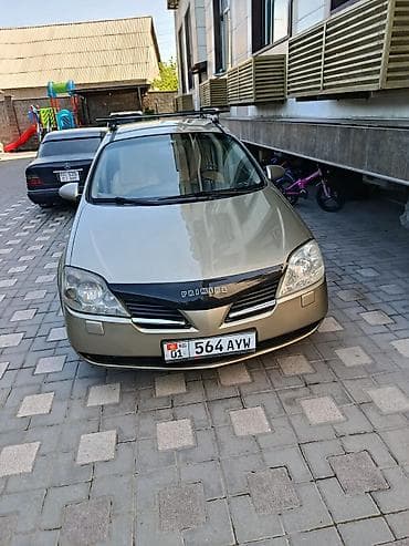 саната желтый: Nissan Primera: 2003 г., 0.2 л, Механика, Бензин, Универсал — 1