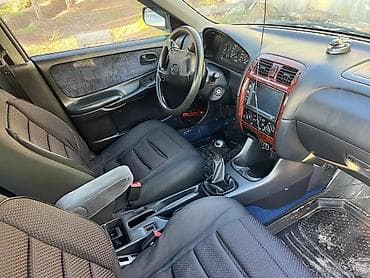 Продажа авто: Mazda 626: 1997 г., 1.8 л, Механика, Бензин, Седан — 7