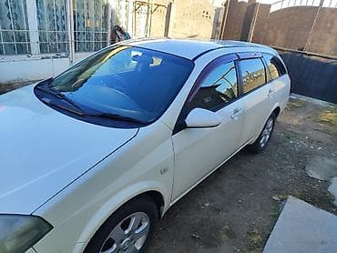 Nissan Primera: 2002 г., Универсал — 2