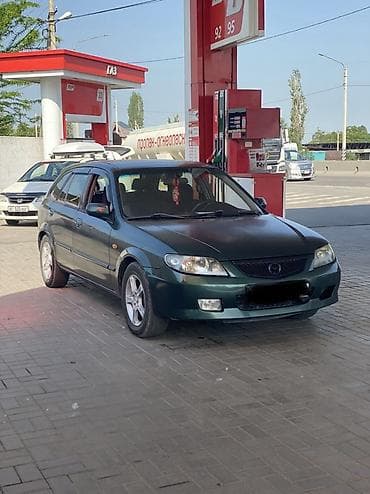 Транспорт: Mazda 323: 2002 г., 1.6 л, Механика, Бензин, Хэтчбэк — 3