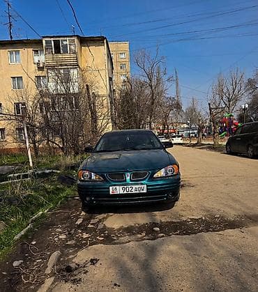 Транспорт: Pontiac Grand AM: 2004 г., 3.4 л, Автомат, Бензин, Седан — 3