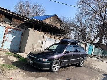 штамп 2107: Mazda 626: 2000 г., 2 л, Механика, Бензин, Универсал — 2
