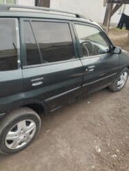 очень нужны: Mazda Demio: 1999 г., 1.3 л, Автомат, Бензиновая, Хэтчбэк — 8