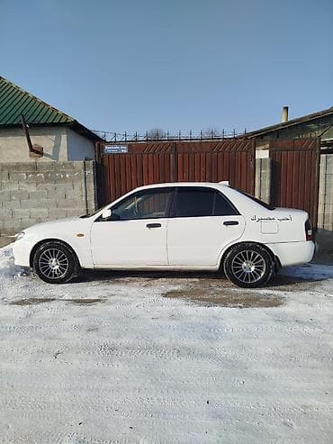 mazda 323 авто: Mazda Familia: 2001 г., 1.3 л, Автомат, Бензин, Седан — 5
