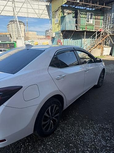 mazda 3 2005: Toyota Corolla: 2019 г., 1.8 л, Автомат, Электромобиль, Седан — 4