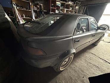 second tech: Mazda 323: 1990 г., 1.6 л, Механика, Бензин, Хэтчбэк — 5