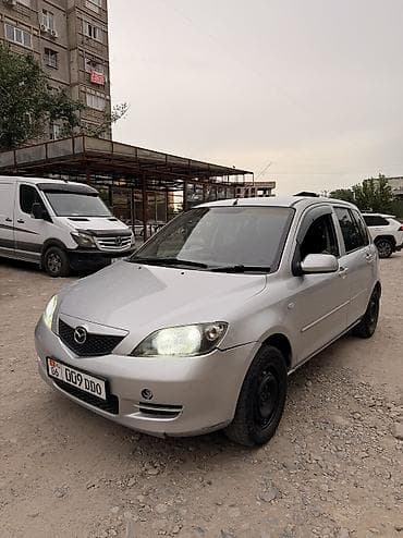 нексе: Mazda Demio: 2003 г., 1.3 л, Автомат, Бензин, Лифтбек — 2