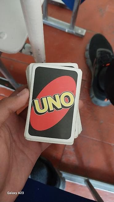 Карточная игра UNO - Классическая колода UNO с фирменной рубашкой. -