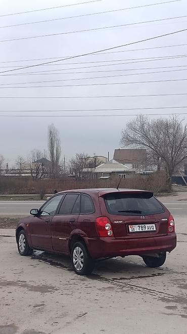 matiz 2009: Mazda 323: 2003 г., 1.3 л, Механика, Бензин, Хэтчбэк — 3