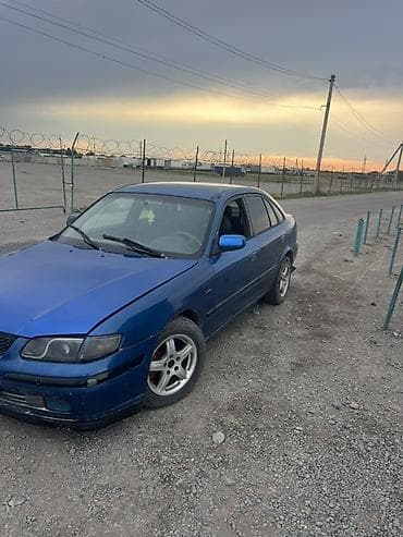 малибу крыло: Mazda 626: 1998 г., 2 л, Механика, Бензин, Седан — 3