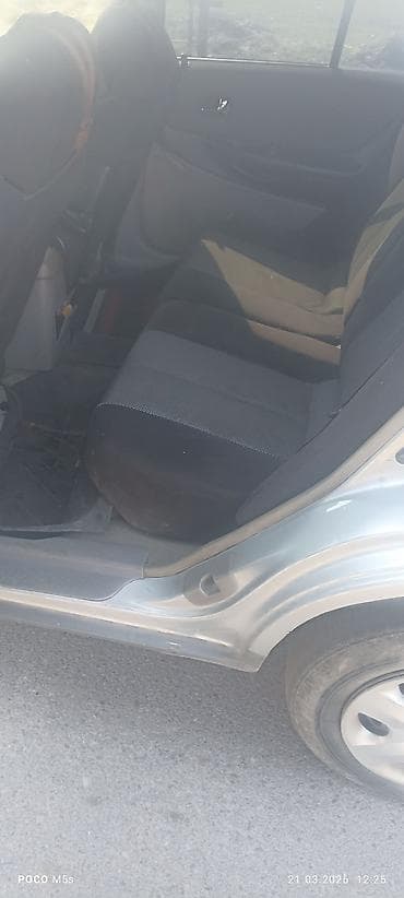 chery tiggo: Mazda 323: 2003 г., 1.6 л, Ручные, Бензин, Хэтчбэк — 10