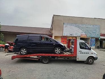 Услуги эвакуатора: С манипулятором, С лебедкой, С ломаной платформой — 1