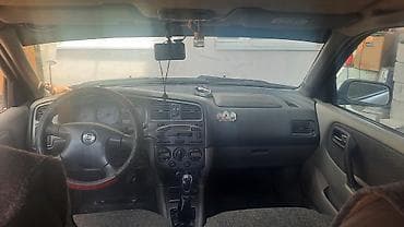 Nissan Primera: 2001 г., 1.8 л, Механика, Бензин