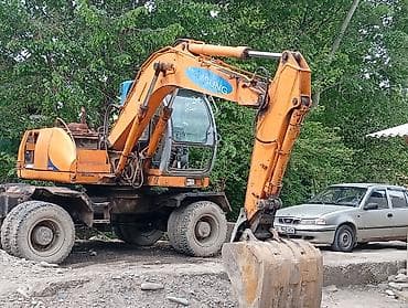 tesla kg: Экскаватор, Samsung, 1998 г., Колесный — 1