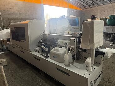 Кромкооблицовочный станок KDT 368J Описание: - Профессиональная