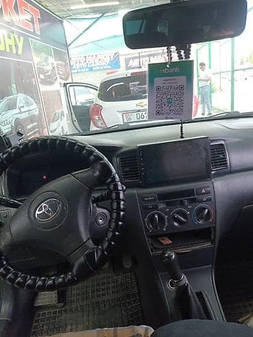 электрик гибрид: Toyota Corolla: 2004 г., Механика, Бензин, Универсал — 5