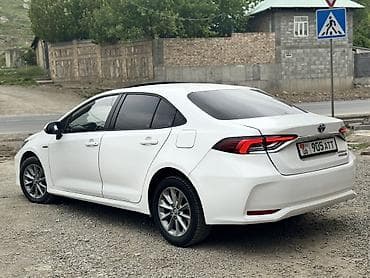 e6 3: Toyota Corolla: 2019 г., 1.8 л, Вариатор, Гибрид, Седан — 3