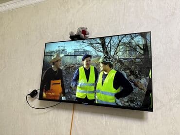 Видеоигры и приставки: Телевизор Panasonic, тонкая рамка, диагональ ориентировочно 43–50" — 2