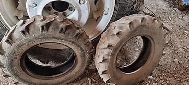 киа 9: Пара узкoproфильных шин с тракторным протектором (ёлочка) для передней — 1