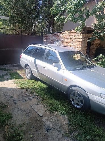 коса купить: Mazda Capella: 2002 г., 2 л, Механика, Газ, Универсал — 2