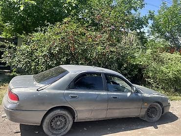 nardo grey: Mazda 626: 1996 г., 2 л, Механика, Бензин, Седан — 4