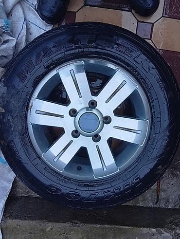 резиновый коврик: Колеса в сборе 235 / 65 / R 16, Всесезонная, Новый, 1 шт, Легковые, Литые, отверстий - 5 — 1