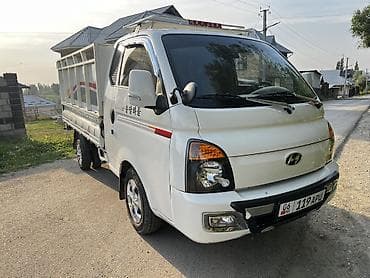 грузовики легкие: Hyundai Porter II грузовой бортовой - Компактный городской грузовик с — 1