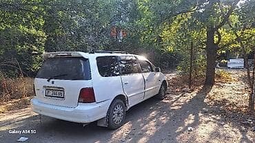 додже караван: Honda Odyssey: 1998 г., 2.3 л, Автомат, Бензин, Минивэн — 6