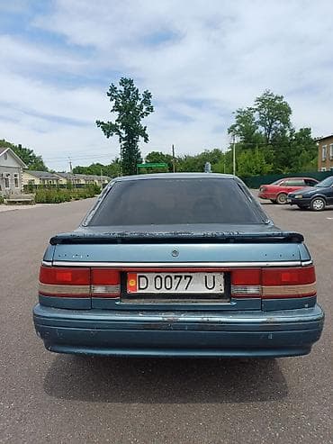 радар авто: Mazda 626: 1988 г., 2 л, Бензин, Седан — 5