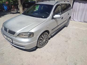 Серебристый универсал (5 дверей) с багажными рейлингами и тонкими