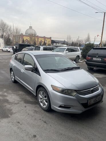 Honda: Honda Insight: 2009 г., 1.4 л, Вариатор, Гибрид — 2