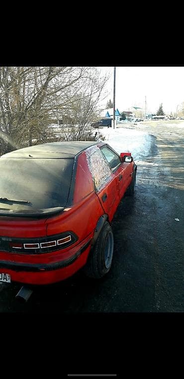 мазда демио 1999год: Mazda 323: 1992 г., 1.6 л, Механика, Бензин — 5