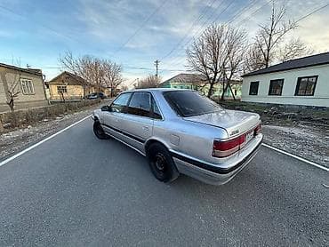 124 e500: Mazda 626: 1993 г., Седан — 6