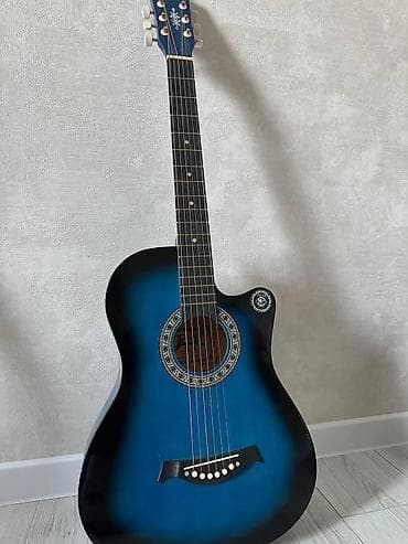 Акустическая гитара 6-струнная с вырезом (cutaway). Корпус формата