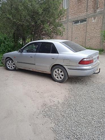 mazda 325: Mazda 626: 1999 г., 1.8 л, Механика, Бензин, Седан — 4