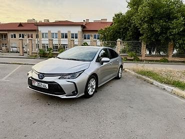 byd e2 2023: Toyota Corolla: 2023 г., 1.8 л, Вариатор, Гибрид, Седан — 1