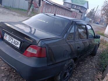 меняю дом на машину: Daewoo Nexia: 2010 г., 1.5 л, Механика, Бензиновая, Седан — 4