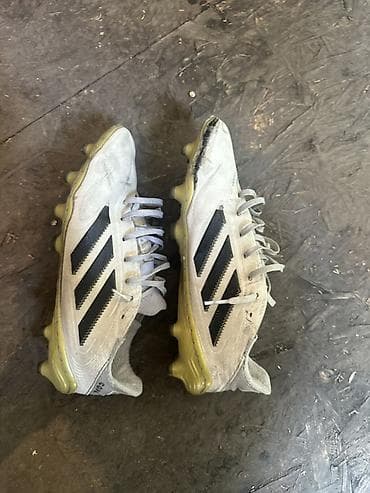 ролер: Футбольные бутсы Adidas Copa с шипами для натурального газона — 1