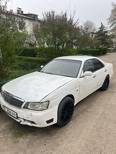 буфер спринтер: Nissan Laurel: 2000 г. — 5