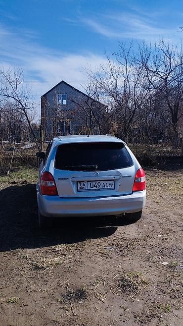 мазда унверсал: Mazda 323: 2002 г., 1.3 л, Ручные, Бензин, Универсал — 4