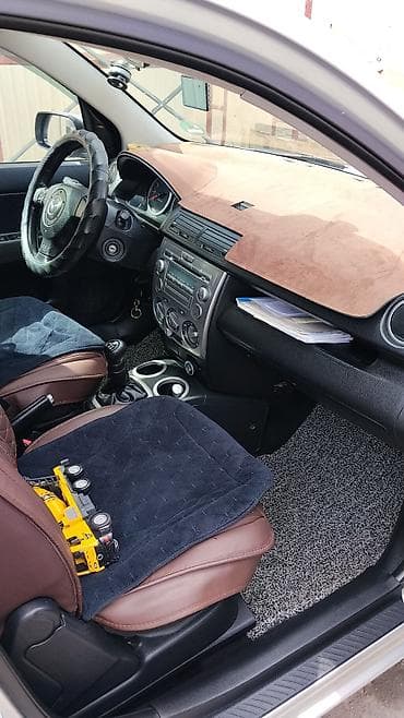 мазда фк: Mazda Demio: 2007 г., 1.4 л, Робот, Бензин, Хэтчбэк — 10