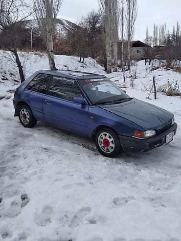 Mazda 323: 1994 г., Хэтчбэк