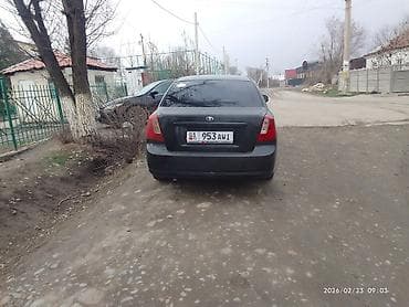 кио к5: Daewoo Gentra: 2013 г., 1.5 л, Механика, Газ, Седан — 7