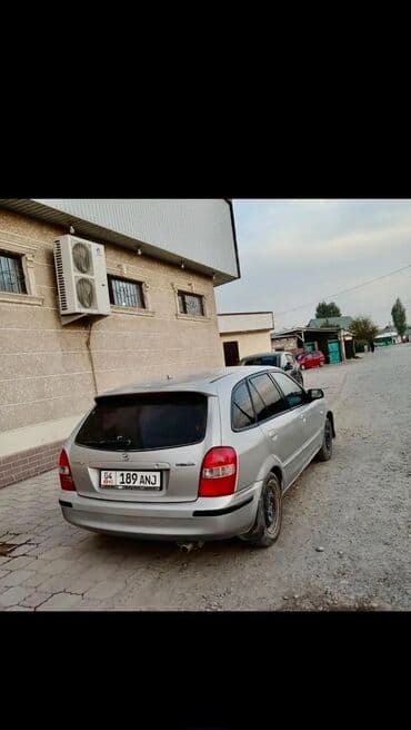 Mazda 323: 2002 г., 1.6 л, Механика, Бензин, Хэтчбэк