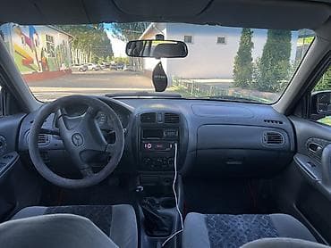 ваз 2112: Mazda 323: 1998 г., 1.5 л, Механика, Бензин, Хэтчбэк — 10