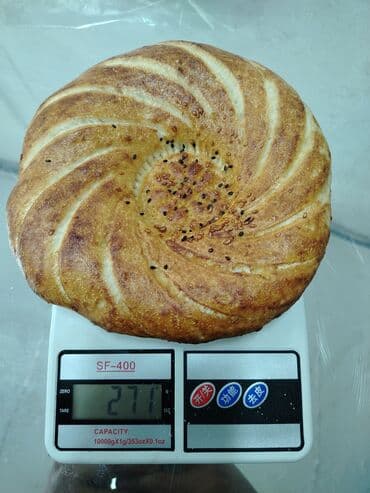 Лепёшки нан - Традиционная круглая узбекская лепёшка с узором в