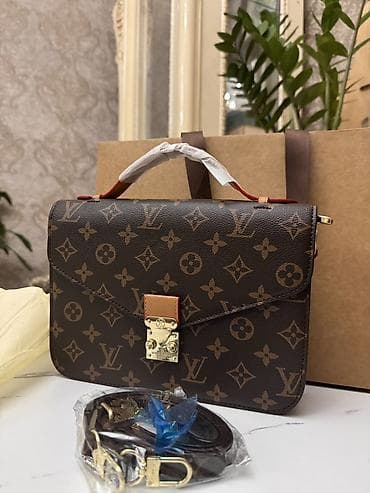 шопперы цена: Сумка Louis Vuitton Pochette Métis Monogram Модель выполнена из — 10