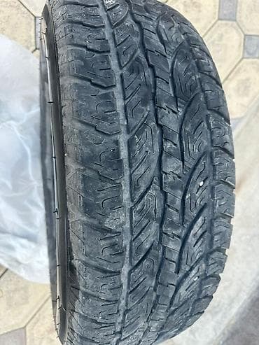 арык бетонный: Шины 265 / 70 / R 17, Всесезонная, Б/у, Комплект, Внедорожные (АТ/МТ), США, Tourador — 1