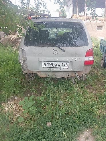 аудио касета: Mazda 2: 2003 г., 1.3 л, Автомат, Бензин, Хэтчбэк — 2